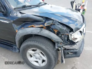 2003 Toyota Tacoma PreRunner z VIN 5TEGN92N03Z210194, wystawiony jako IAAI lot #42243037 z przebiegiem 241 047 mil mil oraz . Historia ofert i sprzedaży dostępna na DreamBid. Obrazek 6.