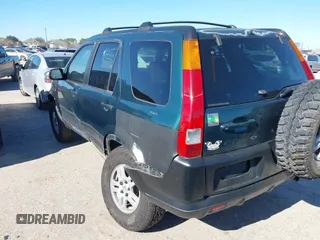 2002 Honda CR-V EX with VIN JHLRD78842C040973, listed as a IAAI auction lot 41214880 with 153,429 mi miles and . Bid and sale history available at DreamBid. Image 3.