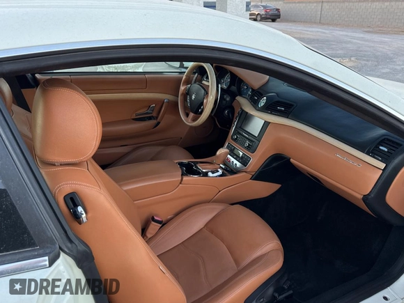 2012 Maserati GranTurismo S z VIN ZAM45KLA1C0061862, wystawiony jako Copart lot #87091844 z przebiegiem 31 825 mil mil oraz Czysty tytuł • Clean title. Historia ofert i sprzedaży dostępna na DreamBid. Obrazek 5.