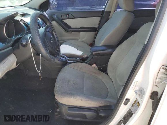 2010 Kia Forte EX with VIN KNAFU4A22A5184977, listed as a Copart auction lot 77189024 with Not Provided miles and Clean Title. Bid and sale history available at carsss.com. Image 7.