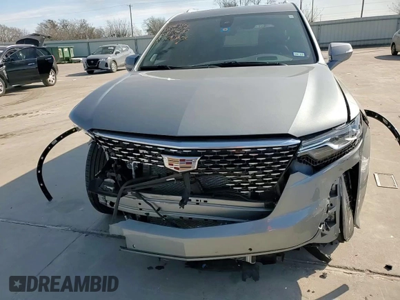 2023 Cadillac XT6 FWD Premium Luxury with VIN 1GYKPCRS4PZ124119, listed as a Copart auction lot 87836515 with 14,752 mi miles and Salvage title. Bid and sale history available at DreamBid. Image 12.