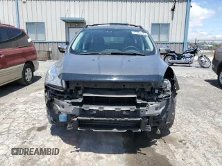 2014 Ford Escape SE с VIN 1FMCU9G90EUC19255, выставлен на аукционе Copart как лот 57267775 с пробегом 102 924 миль миль и Списание • Salvage title. История ставок и продаж доступна на DreamBid. Изображение 5.