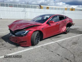 2023 Tesla Model S z VIN 5YJSA1E56PF521168, wystawiony jako Copart lot #48801465 z przebiegiem Nie podano mil oraz Szkoda całkowita • Salvage title. Historia ofert i sprzedaży dostępna na DreamBid. Obrazek 1.