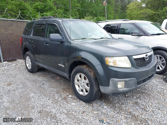 2008 Mazda Tribute Touring with VIN 4F2CZ02ZX8KM25983, listed as a IAAI auction lot 42122836 with 148,080 mi miles. Bid and sale history available at carsss.com. Image 1.