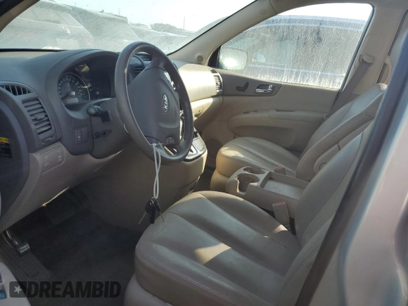 2012 Kia Sedona EX with VIN KNDMH4C72C6459882, listed as a Copart auction lot 77481744 with 136,947 mi miles and Salvage Title. Bid and sale history available at carsss.com. Image 7.