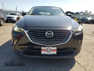 2016 Mazda CX-3 Grand Touring z VIN JM1DKBD79G0124504, wystawiony jako Copart lot #53663945 z przebiegiem 94 253 mil mil oraz Szkoda całkowita • Salvage title. Historia ofert i sprzedaży dostępna na DreamBid. Obrazek 5.