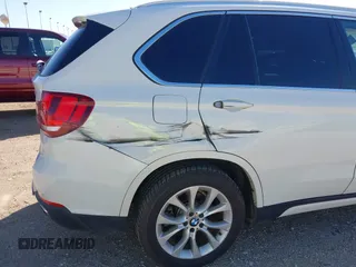2014 BMW X5 sDrive35i with VIN 5UXKR2C53E0C01692, listed as a IAAI auction lot 41727216 with 135,985 mi miles. Bid and sale history available at carsss.com. Image 6.
