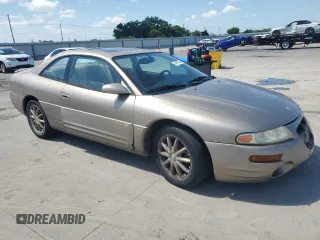 1999 Chrysler Sebring LXi with VIN 4C3AU52N1XE071836, listed as a Copart auction lot 54136735 with 151,531 mi miles and Salvage Title. Bid and sale history available at DreamBid. Image 4.