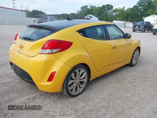 2012 Hyundai Veloster w/Gray Int z VIN KMHTC6AD7CU026855, wystawiony jako IAAI lot #42253694 z przebiegiem 119 802 mil mil oraz . Historia ofert i sprzedaży dostępna na DreamBid. Obrazek 4.