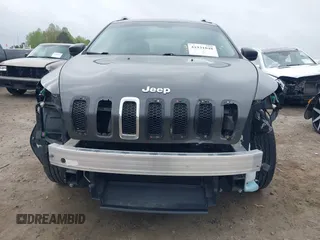 2015 Jeep Cherokee Latitude with VIN 1C4PJLCB0FW601862, listed as a IAAI auction lot 41931048 with 100,705 mi miles and . Bid and sale history available at DreamBid. Image 6.