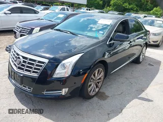 2013 Cadillac XTS Premium with VIN 2G61S5S39D9144177, listed as a IAAI auction lot 42111910 with 69,830 mi miles. Bid and sale history available at carsss.com. Image 19.