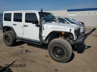 2015 Jeep Wrangler Unlimited Rubicon with VIN 1C4BJWFG1FL750561, listed as a Copart auction lot 60797075 with 95,677 mi miles and Salvage title. Bid and sale history available at DreamBid. Image 4.