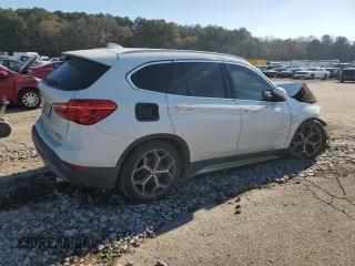 2019 BMW X1 sDrive28i with VIN WBXHU7C53K3H45694, listed as a Copart auction lot 85804084 with 151,645 mi miles and Salvage Title. Bid and sale history available at DreamBid. Image 3.