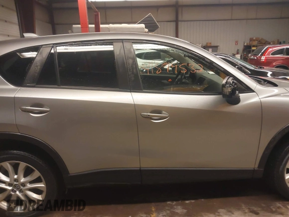 2014 Mazda CX-5 Grand Touring with VIN JM3KE4DY5E0305882, listed as a IAAI auction lot 41879532 with 173,443 mi miles. Bid and sale history available at carsss.com. Image 13.