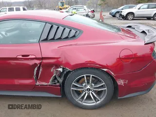 2015 Ford Mustang EcoBoost with VIN 1FA6P8TH6F5357867, listed as a IAAI auction lot 42011136 with 58,099 mi miles and . Bid and sale history available at carsss.com. Image 6.