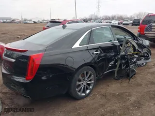 2013 Cadillac XTS Luxury with VIN 2G61R5S31D9221345, listed as a IAAI auction lot 41547095 with 148,070 mi miles. Bid and sale history available at carsss.com. Image 4.