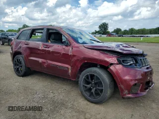 2018 Jeep Grand Cherokee Trackhawk with VIN 1C4RJFN94JC344008, listed as a Copart auction lot 63209125 with Not provided miles and Salvage title. Bid and sale history available at DreamBid. Image 4.