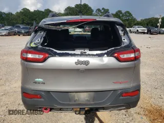 2016 Jeep Cherokee Trailhawk z VIN 1C4PJMBSXGW121272, wystawiony jako Copart lot #61769505 z przebiegiem 119 353 mil mil oraz Szkoda całkowita • Salvage title. Historia ofert i sprzedaży dostępna na DreamBid. Obrazek 6.