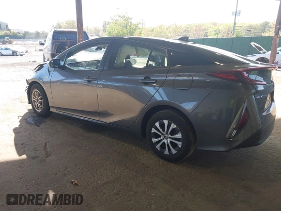 2021 Toyota Prius LE with VIN JTDKAMFP2M3168342, listed as a IAAI auction lot 42132946 with 69,628 mi miles and . Bid and sale history available at DreamBid. Image 3.