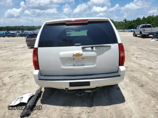 2014 Chevrolet Tahoe Commercial with VIN 1GNLC2E04ER202441, listed as a Copart auction lot 61310725 with 117,443 mi miles and Salvage title. Bid and sale history available at DreamBid. Image 6.