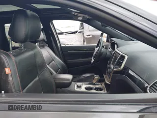 2016 Jeep Grand Cherokee Limited z VIN 1C4RJFBG5GC406494, wystawiony jako IAAI lot #41662039 z przebiegiem 139 944 mil mil oraz . Historia ofert i sprzedaży dostępna na DreamBid. Obrazek 5.