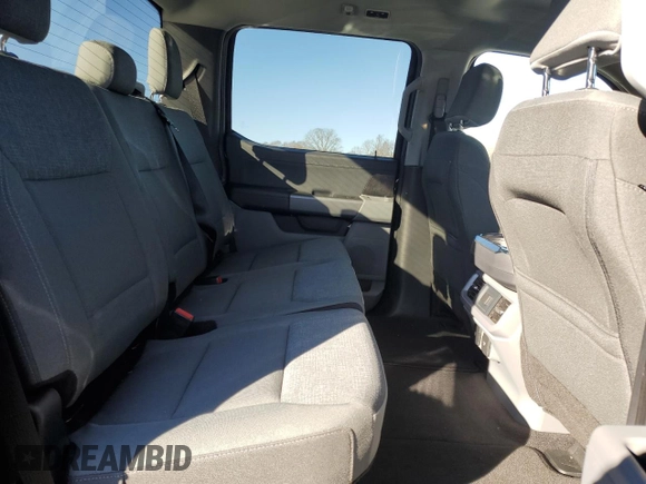2024 Ford F-150 Lightning XLT with VIN 1FTVW3LK1RWG18473, listed as a Copart auction lot 86523084 with 6,824 mi miles and Salvage title. Bid and sale history available at DreamBid. Image 10.