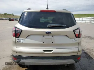 2018 Ford Escape SE z VIN 1FMCU9GD5JUC08024, wystawiony jako Copart lot #56531105 z przebiegiem 54 104 mil mil oraz Szkoda całkowita • Salvage title. Historia ofert i sprzedaży dostępna na DreamBid. Obrazek 6.