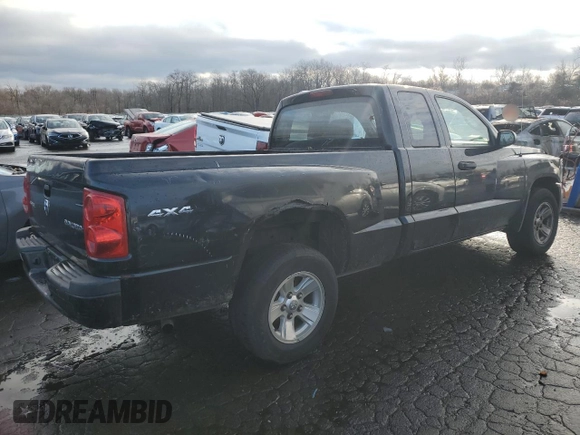 2011 Dodge Dakota z VIN 1D7RW2BK3BS602758, wystawiony jako Copart lot #85288074 z przebiegiem 138 473 mil mil oraz Szkoda całkowita • Salvage title. Historia ofert i sprzedaży dostępna na DreamBid. Obrazek 3.