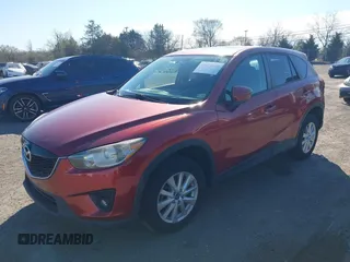 2013 Mazda CX-5 Touring with VIN JM3KE4CE7D0165324, listed as a IAAI auction lot 41879800 with 31,912 mi miles. Bid and sale history available at carsss.com. Image 2.
