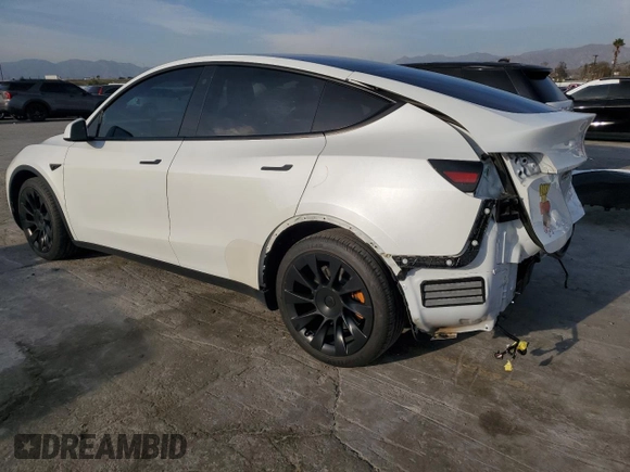 2021 Tesla Model Y Long Range z VIN 5YJYGDEE7MF090698, wystawiony jako Copart lot #44192555 z przebiegiem 78 907 mil mil oraz Szkoda całkowita • Salvage title. Historia ofert i sprzedaży dostępna na DreamBid. Obrazek 2.