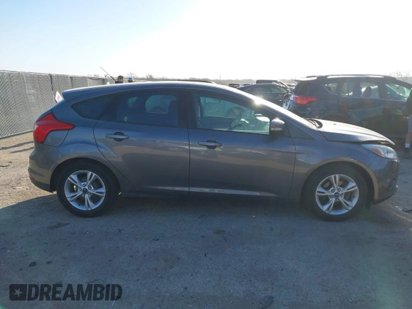 2013 Ford Focus SE with VIN 1FADP3K29DL220311, listed as a IAAI auction lot 41790487 with 136,257 mi miles. Bid and sale history available at carsss.com. Image 13.