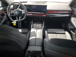 2024 BMW i5 eDrive40 with VIN WBY33FK04RCR92576, listed as a Copart auction lot 51180875 with 11,289 mi miles and Salvage title. Bid and sale history available at DreamBid. Image 8.