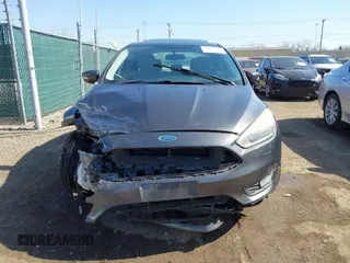 2015 Ford Focus SE with VIN 1FADP3F29FL268677, listed as a IAAI auction lot 42037244 with 118,018 mi miles. Bid and sale history available at carsss.com. Image 13.