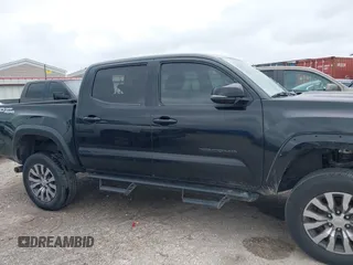 2017 Toyota Tacoma SR5 with VIN 5TFAZ5CN8HX052459, listed as a IAAI auction lot 41495281 with 212,314 mi miles and . Bid and sale history available at DreamBid. Image 13.