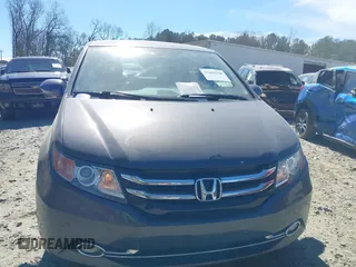 2014 Honda Odyssey Touring with VIN 5FNRL5H92EB016546, listed as a IAAI auction lot 41689148 with 143,601 mi miles and . Bid and sale history available at DreamBid. Image 12.