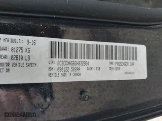 2016 Dodge Charger SXT with VIN 2C3CDXHG6GH332854, listed as a IAAI auction lot 42094761 with 114,883 mi miles. Bid and sale history available at carsss.com. Image 9.