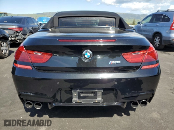 2013 BMW M6 с VIN WBSLZ9C58DDZ78154, выставлен на аукционе Copart как лот 50434845 с пробегом 66 983 миль миль и Списание • Salvage title. История ставок и продаж доступна на DreamBid. Изображение 6.