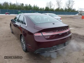 2017 Lincoln MKZ Select z VIN 3LN6L5CC3HR620854, wystawiony jako IAAI lot #41042376 z przebiegiem 131 517 mil mil oraz . Historia ofert i sprzedaży dostępna na DreamBid. Obrazek 3.