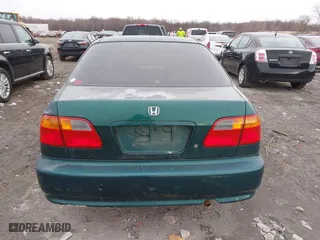 1999 Honda Civic VP with VIN 2HGEJ6617XH537283, listed as a IAAI auction lot 41483084 with 153,655 mi miles. Bid and sale history available at carsss.com. Image 16.