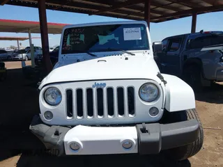 2016 Jeep Wrangler Unlimited Sahara with VIN 1C4BJWEG0GL126270, listed as a IAAI auction lot 42229364 with 50,847 mi miles and . Bid and sale history available at DreamBid. Image 12.