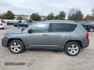 2011 Jeep Compass with VIN 1J4NF1FB1BD251618, listed as a IAAI auction lot 41633368 with 125,326 mi miles. Bid and sale history available at carsss.com. Image 14.