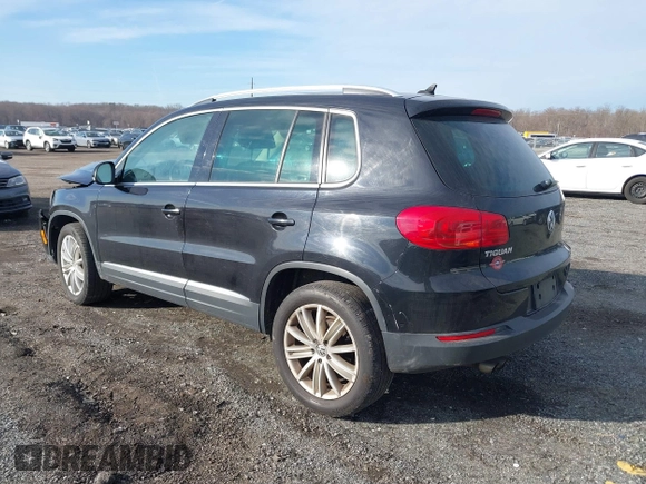 2012 Volkswagen Tiguan SE with VIN WVGAV7AX3CW531264, listed as a IAAI auction lot 41651242 with 190,669 mi miles and . Bid and sale history available at DreamBid. Image 3.