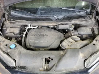2021 Honda Passport Sport z VIN 5FNYF7H26MB008613, wystawiony jako Copart lot #50929525 z przebiegiem 188 879 mil mil oraz Szkoda całkowita • Salvage title. Historia ofert i sprzedaży dostępna na DreamBid. Obrazek 13.