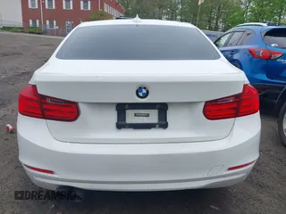 2014 BMW 3 Series 328i xDrive with VIN WBA3B5C56EP544400, listed as a IAAI auction lot 42172100 with 242,472 mi miles. Bid and sale history available at carsss.com. Image 16.