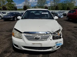 2007 Kia Spectra EX z VIN KNAFE122275474185, wystawiony jako Copart lot #55979575 z przebiegiem 122 776 mil mil oraz Szkody całkowita. Historia ofert i sprzedaży dostępna na DreamBid. Obrazek 5.