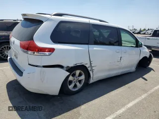 2014 Toyota Sienna LE AAS with VIN 5TDKK3DC8ES442280, listed as a Copart auction lot 59374985 with 207,563 mi miles and Salvage title. Bid and sale history available at DreamBid. Image 3.