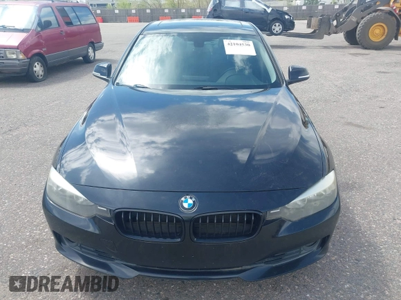 2014 BMW 3 Series 328i xDrive with VIN WBA3B3C56EJ981322, listed as a IAAI auction lot 42104530 with 104,376 mi miles. Bid and sale history available at carsss.com. Image 12.