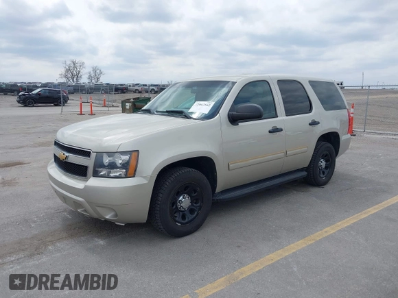 2013 Chevrolet Tahoe Commercial with VIN 1GNLC2E07DR266441, listed as a IAAI auction lot 42062162 with 133,321 mi miles and . Bid and sale history available at DreamBid. Image 2.