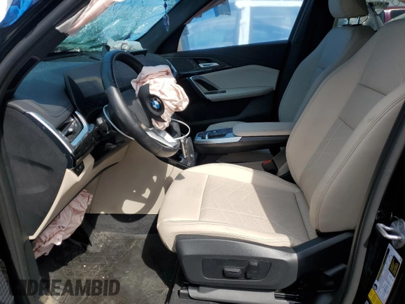 2023 BMW X1 xDrive28i with VIN WBX73EF08P5X85250, listed as a Copart auction lot 50158565 with 7,312 mi miles and Salvage Title. Bid and sale history available at DreamBid. Image 7.