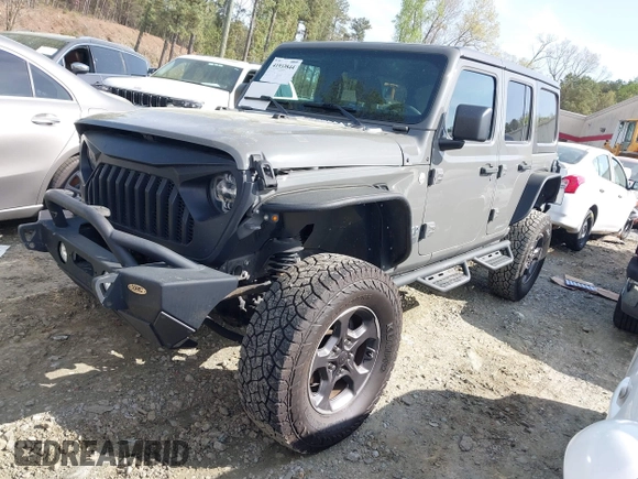 2019 Jeep Wrangler Unlimited Sport Altitude with VIN 1C4HJXDG3KW639148, listed as a IAAI auction lot 41933844 with 57,184 mi miles and . Bid and sale history available at DreamBid. Image 19.
